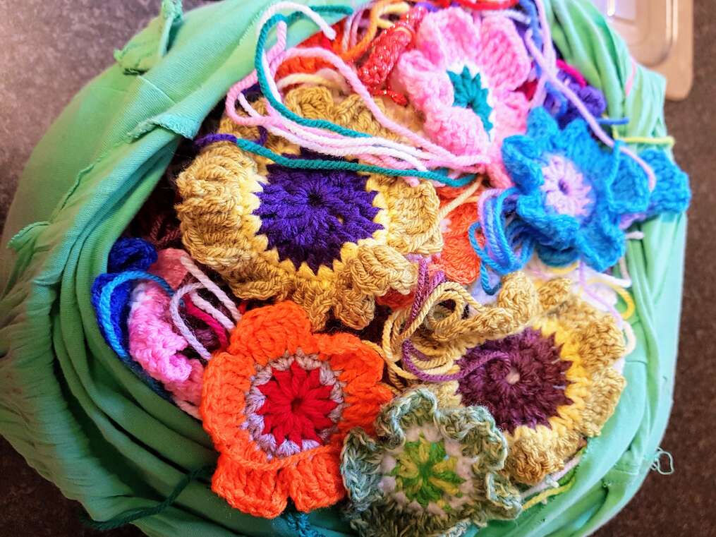 bag of crocheted flowers