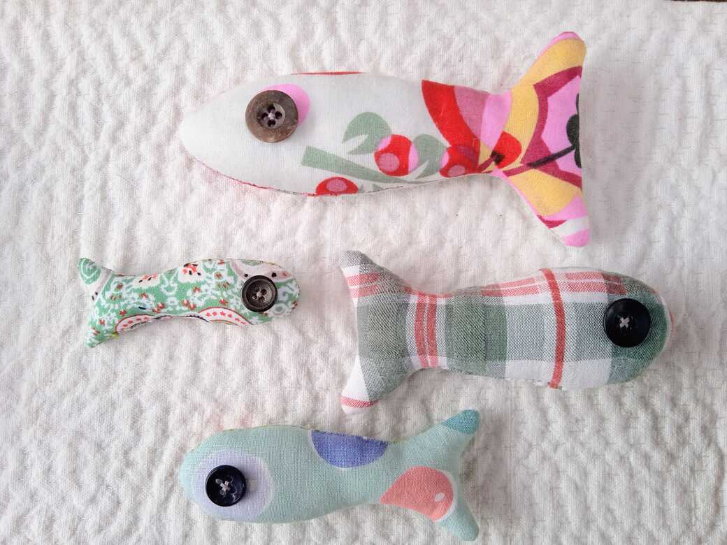 Fabric fish with button eyes.