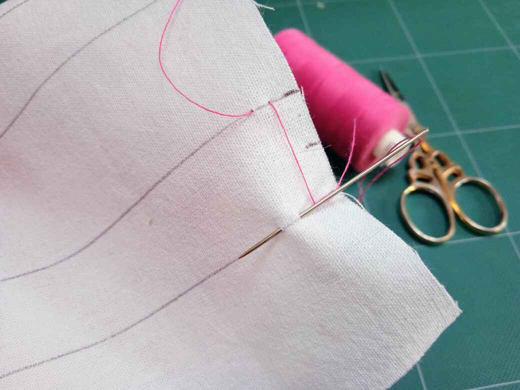 How to sew ladder stitch - Step 2: Make alternate stitches between top and bottom line to make ladder structure with thread.
