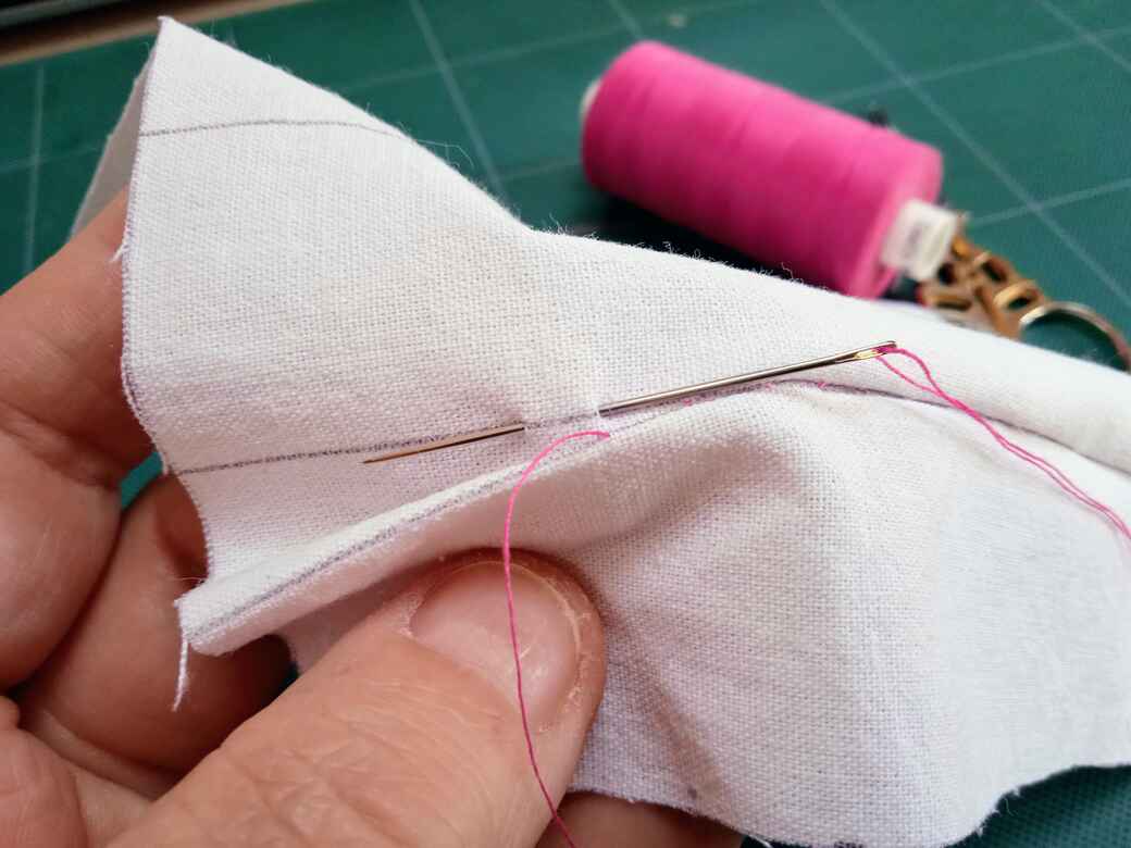How to sew ladder stitch - Step 5B: Continue stitching along the two sides of the opening to the end.
