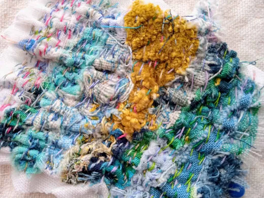 layers of stitches coloured threads