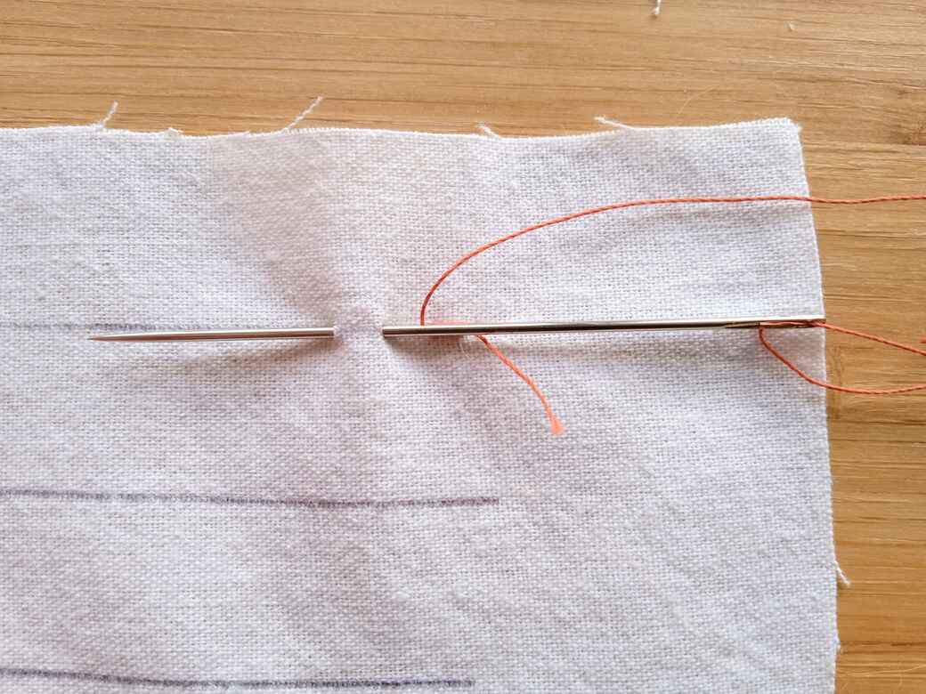 Learn to sew running stitch, step 3.