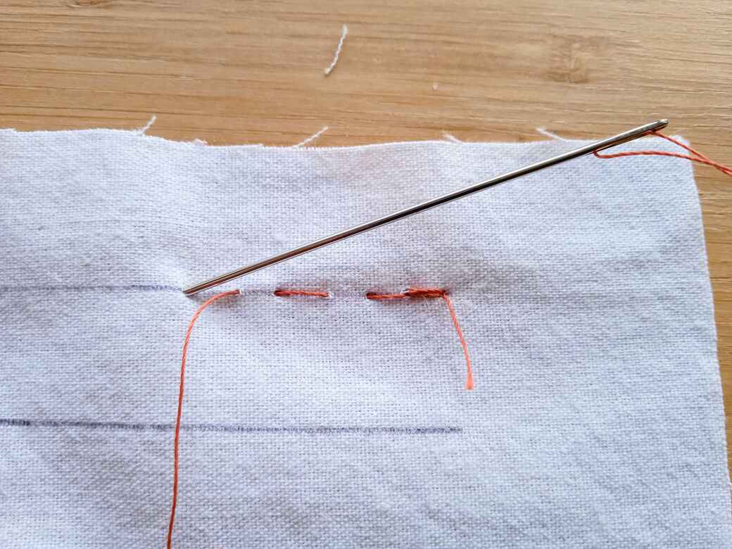 Learn to sew running stitch step 4.