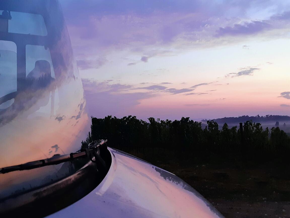 Mercedes vario self build camper, Tuscany sunset reflection