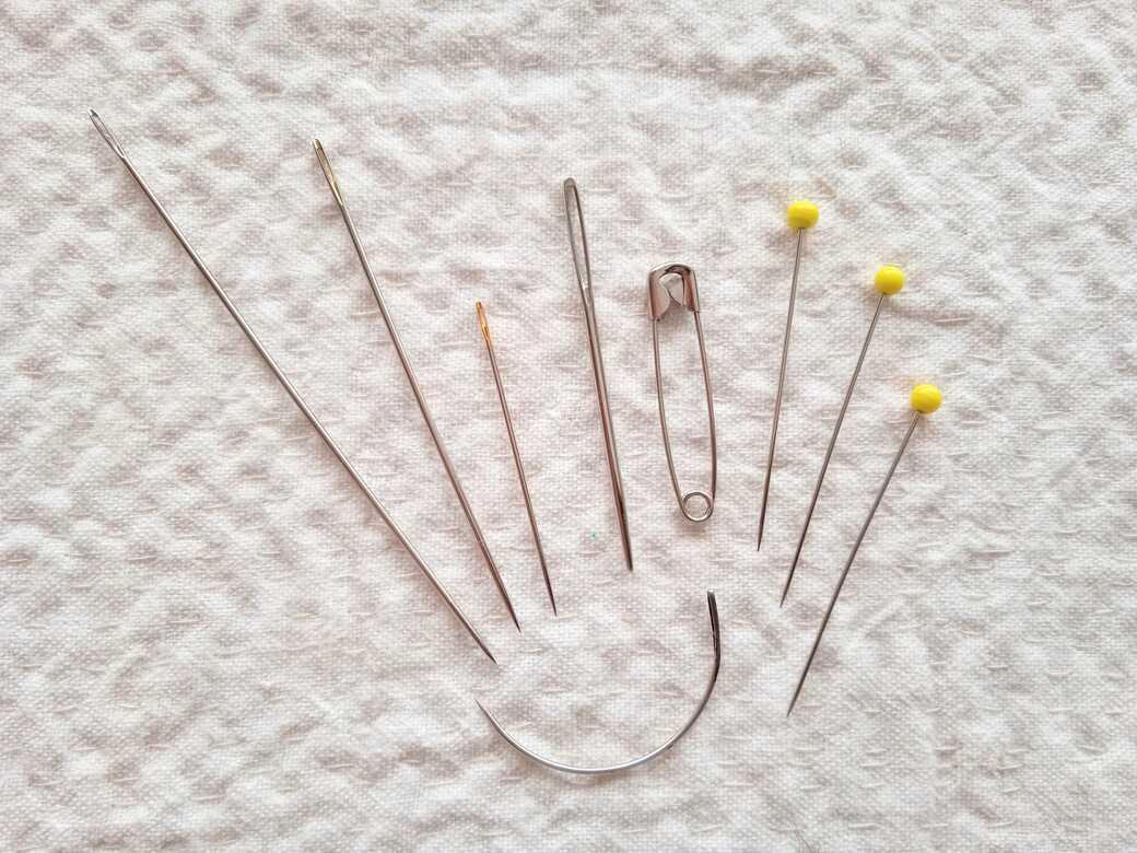 Basic sewing tool kit needles and pins