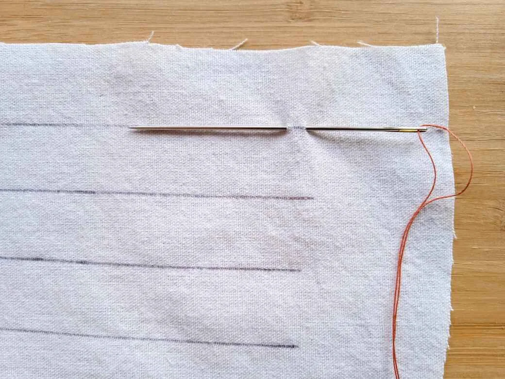 Learn to sew, running stitch step 2: anchor the thread.