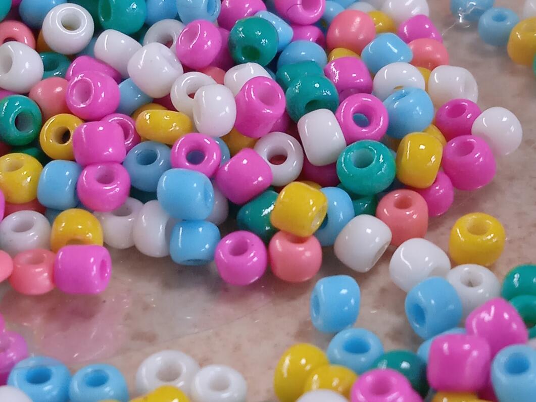 Tiny brightly coloured glass beads