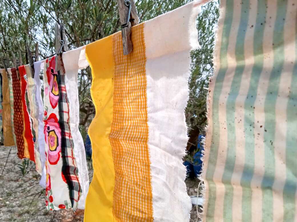 tea dyed fabric drying outside