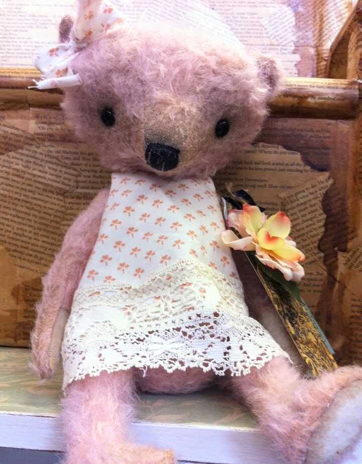 Vintage style teddy bear girl with dress.