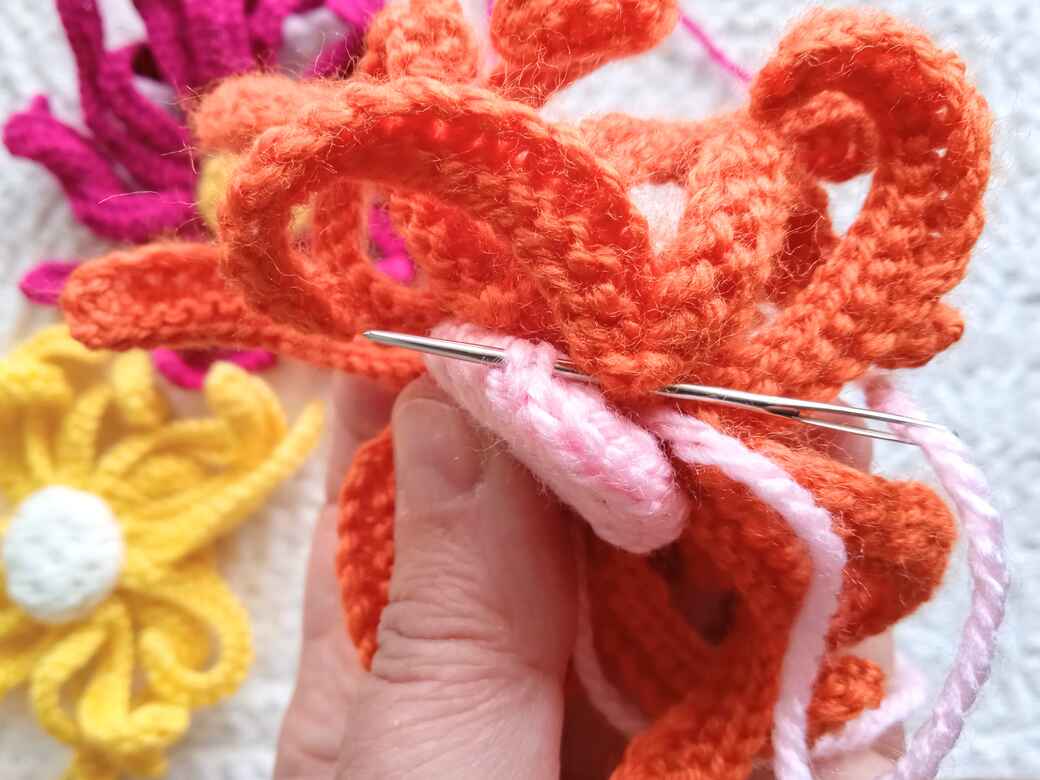 Wall Flowers, knitted flower centre attach to petals.