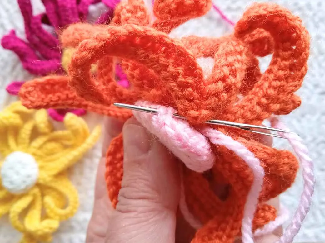 Wall Flowers, knitted flower centre attach to petals.