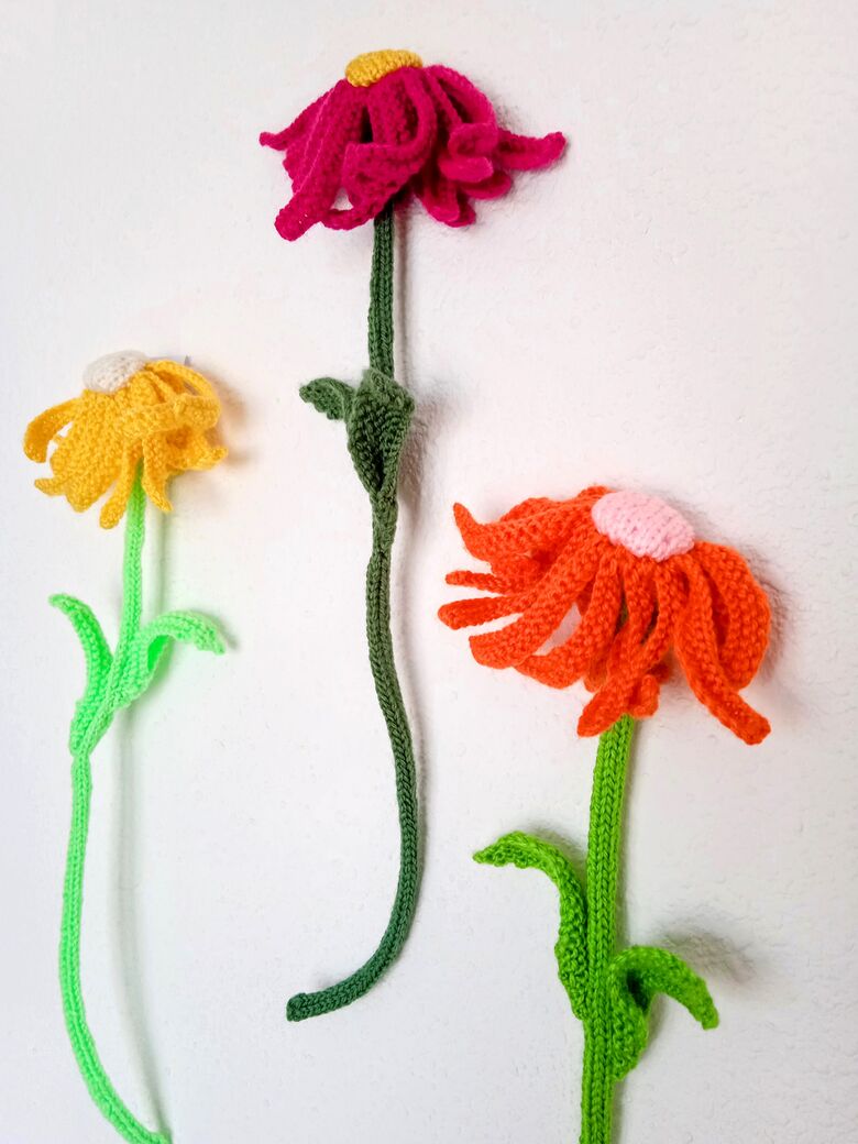 Wall flowers beautiful knitted flowers for your home.